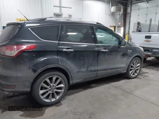 2014 Ford Escape SE with VIN 1FMCU9GXXEUD09124, listed as a IAAI auction lot 41747925 with 147,996 mi miles and . Bid and sale history available at DreamBid. Image 14.
