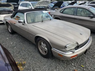 1995 Jaguar XJS with VIN SAJNX2747SC196723, listed as a Copart auction lot 74147364 with 70,138 mi miles and Salvage Title. Bid and sale history available at carsss.com. Image 4.