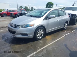 2010 Honda Insight EX z VIN JHMZE2H77AS019610, wystawiony jako IAAI lot #42207678 z przebiegiem 226 577 mil mil oraz . Historia ofert i sprzedaży dostępna na DreamBid. Obrazek 2.
