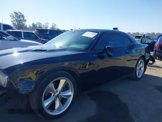 2014 Dodge Challenger R/T z VIN 2C3CDYBT2EH313789, wystawiony jako IAAI lot #42020945 z przebiegiem 182 788 mil mil oraz . Historia ofert i sprzedaży dostępna na DreamBid. Obrazek 15.