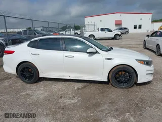 2016 Kia Optima EX with VIN 5XXGU4L38GG013197, listed as a IAAI auction lot 42125301 with 110,128 mi miles. Bid and sale history available at carsss.com. Image 13.