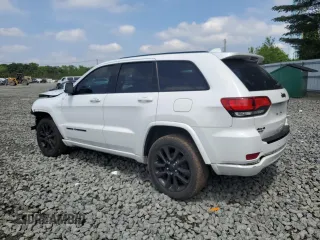 2018 Jeep Grand Cherokee Altitude with VIN 1C4RJFAGXJC122688, listed as a Copart auction lot 61290525 with 106,671 mi miles and Salvage title. Bid and sale history available at DreamBid. Image 2.