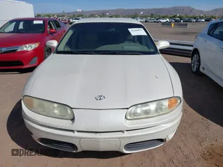 2001 Oldsmobile Aurora z VIN 1G3GR64H414288395, wystawiony jako IAAI lot #42260825 z przebiegiem 246 744 mil mil oraz . Historia ofert i sprzedaży dostępna na DreamBid. Obrazek 6.