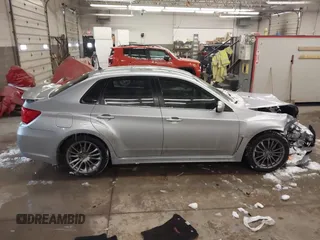 2012 Subaru WRX WRX z VIN JF1GV7E65CG023040, wystawiony jako IAAI lot #41622053 z przebiegiem 110 718 mil mil oraz . Historia ofert i sprzedaży dostępna na DreamBid. Obrazek 13.