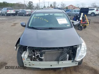 2019 Nissan Versa SV with VIN 3N1CN7AP7KL863891, listed as a IAAI auction lot 41863544 with 90,000 mi miles and . Bid and sale history available at DreamBid. Image 6.