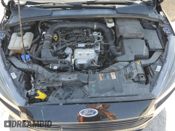 2018 Ford Focus SE z VIN 1FADP3FE5JL236330, wystawiony jako Copart lot #53145065 z przebiegiem 104 228 mil mil oraz Szkoda całkowita • Salvage title. Historia ofert i sprzedaży dostępna na DreamBid. Obrazek 11.