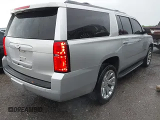2015 Chevrolet Suburban LT with VIN 1GNSCJKC9FR617227, listed as a IAAI auction lot 42127511 with 167,924 mi miles and . Bid and sale history available at DreamBid. Image 4.