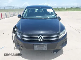 2014 Volkswagen Tiguan SE with VIN WVGAV3AX7EW549326, listed as a IAAI auction lot 42515906 with 102,221 mi miles and . Bid and sale history available at DreamBid. Image 11.
