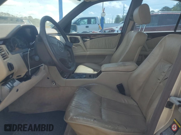 1997 Mercedes-Benz E 320 with VIN WDBJF72F0VA262484, listed as a Copart auction lot 54346945 with 145,352 mi miles and Salvage Title. Bid and sale history available at DreamBid. Image 7.