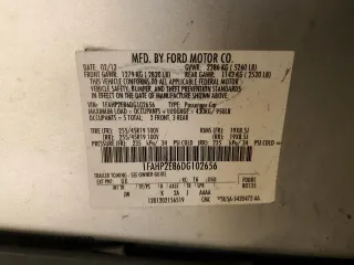 2013 Ford Taurus SEL with VIN 1FAHP2E86DG102656, listed as a Copart auction lot 50393805 with 212,804 mi miles and Clean Title. Bid and sale history available at carsss.com. Image 12.
