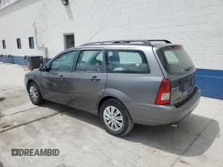 2006 Ford Focus SE with VIN 1FAHP36N56W223049, listed as a Copart auction lot 61211745 with 185,609 mi miles and Salvage title. Bid and sale history available at DreamBid. Image 2.