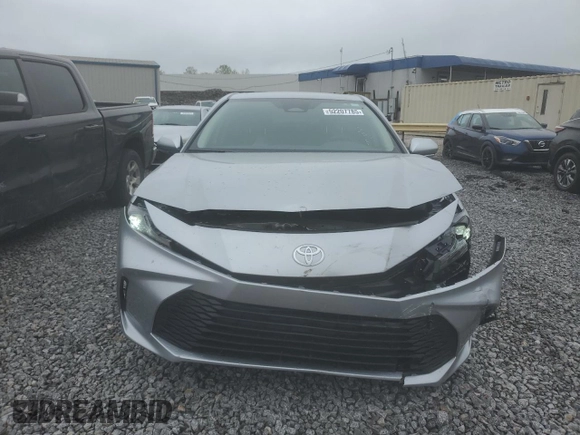 2025 Toyota Camry LE with VIN 4T1DAACKXSU043785, listed as a Copart auction lot 52207785 with 9,410 mi miles and Salvage Title. Bid and sale history available at DreamBid. Image 5.