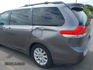 2011 Toyota Sienna XLE AAS with VIN 5TDYK3DC3BS059501, listed as a IAAI auction lot 42185225 with 143,416 mi miles. Bid and sale history available at carsss.com. Image 6.