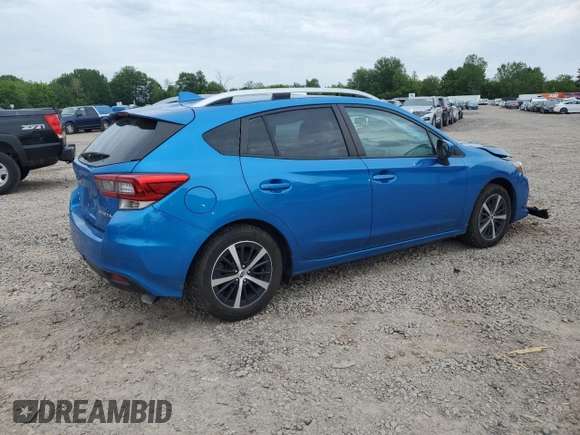 2022 Subaru Impreza Premium with VIN 4S3GTAV60N3711910, listed as a Copart auction lot 60787035 with 58,828 mi miles and Salvage title. Bid and sale history available at DreamBid. Image 3.