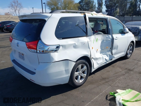 2012 Toyota Sienna LE AAS with VIN 5TDKK3DCXCS276325, listed as a IAAI auction lot 41791385 with 133,635 mi miles. Bid and sale history available at carsss.com. Image 4.