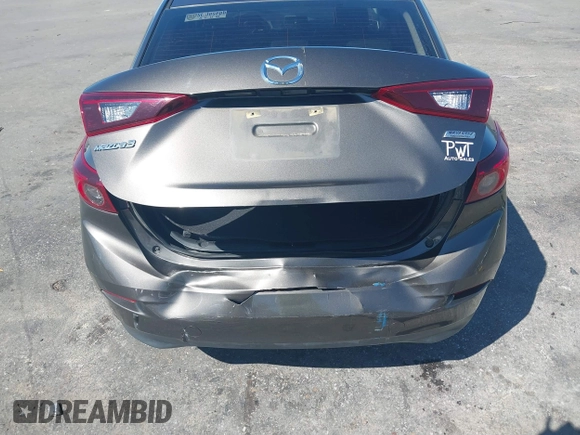 2015 Mazda 3 i SV with VIN JM1BM1T72F1270488, listed as a IAAI auction lot 41827337 with 228,983 mi miles and . Bid and sale history available at DreamBid. Image 6.