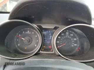 2014 Hyundai Veloster with VIN KMHTC6AD6EU185899, listed as a Copart auction lot 49871335 with 112,787 mi miles and Salvage Title. Bid and sale history available at carsss.com. Image 9.