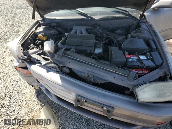 1994 Toyota Camry LE z VIN JT2GK12E6R0055565, wystawiony jako Copart lot #54031255 z przebiegiem 240 841 mil mil oraz Szkoda całkowita • Salvage title. Historia ofert i sprzedaży dostępna na DreamBid. Obrazek 11.