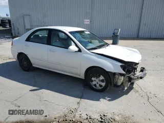 2009 Kia Spectra LX z VIN KNAFE222295640665, wystawiony jako Copart lot #57086945 z przebiegiem 167 640 mil mil oraz Szkoda całkowita • Salvage title. Historia ofert i sprzedaży dostępna na DreamBid. Obrazek 4.