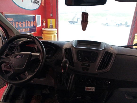 2016 Ford Transit Cargo z VIN 1FTYE1YM4GKA89538, wystawiony jako IAAI lot #42679120 z przebiegiem 223 958 mil mil oraz . Historia ofert i sprzedaży dostępna na DreamBid. Obrazek 21.