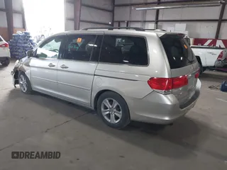 2009 Honda Odyssey Touring с VIN 5FNRL38979B005813, выставлен на аукционе IAAI как лот 41049383 с пробегом 174 897 миль миль и . История ставок и продаж доступна на DreamBid. Изображение 3.