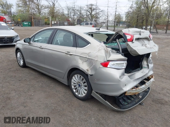 2015 Ford Fusion SE Hybrid with VIN 3FA6P0LU6FR210606, listed as a IAAI auction lot 42070466 with 123,043 mi miles and . Bid and sale history available at DreamBid. Image 3.