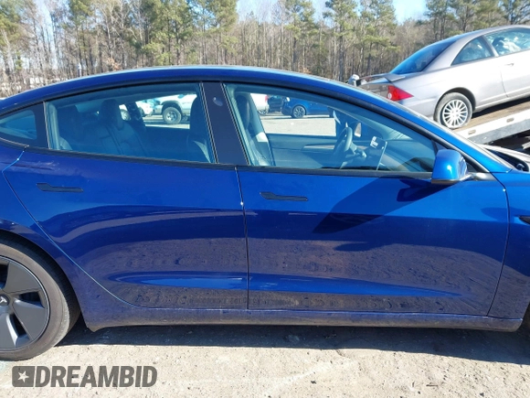 2022 Tesla Model 3 Long Range with VIN 5YJ3E1EB1NF257059, listed as a IAAI auction lot 41329318 with 30,652 mi miles and . Bid and sale history available at DreamBid. Image 13.