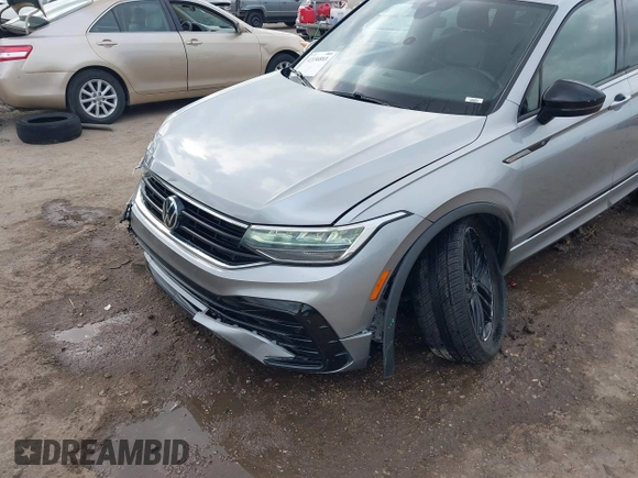 2022 Volkswagen Tiguan SE R-Line Black с VIN 3VVCB7AX6NM075609, выставлен на аукционе IAAI как лот 42156893 с пробегом 189 280 миль миль и . История ставок и продаж доступна на DreamBid. Изображение 6.