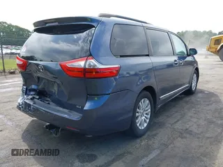 2016 Toyota Sienna XLE z VIN 5TDYK3DC0GS766059, wystawiony jako IAAI lot #42214738 z przebiegiem 143 001 mil mil oraz . Historia ofert i sprzedaży dostępna na DreamBid. Obrazek 4.