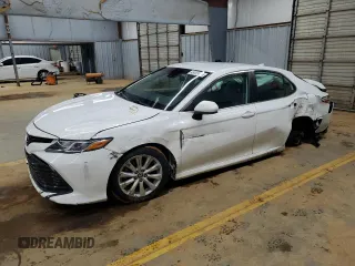 2019 Toyota Camry LE with VIN 4T1B11HKXKU701993, listed as a Copart auction lot 45009855 with 76,033 mi miles and Salvage Title. Bid and sale history available at carsss.com. Image 1.
