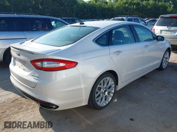 2014 Ford Fusion Titanium with VIN 3FA6P0K95ER128961, listed as a IAAI auction lot 42750668 with 197,188 mi miles and . Bid and sale history available at DreamBid. Image 4.