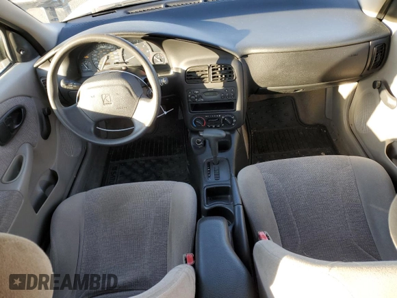 2001 Saturn SL z VIN 1G8ZK52771Z219294, wystawiony jako Copart lot #83155494 z przebiegiem 190 338 mil mil oraz Szkody całkowita. Historia ofert i sprzedaży dostępna na DreamBid. Obrazek 8.