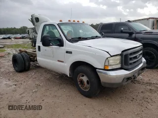 2004 Ford F-350 with VIN 1FDWF36P44EC05243, listed as a Copart auction lot 37153244 with 221,116 mi miles and Salvage title. Bid and sale history available at DreamBid. Image 4.