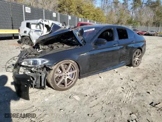 2015 BMW M5 with VIN WBSFV9C56FD595129, listed as a Copart auction lot 41926774 with 65,936 mi miles. Bid and sale history available at carsss.com. Image 1.