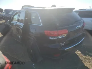 2014 Jeep Grand Cherokee Limited with VIN 1C4RJFBG1EC568426, listed as a Copart auction lot 87039694 with 126,577 mi miles and Salvage title. Bid and sale history available at DreamBid. Image 2.