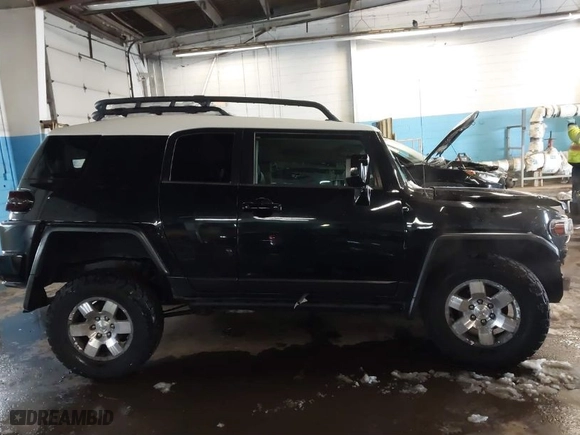 2007 Toyota FJ Cruiser with VIN JTEBU11F970034580, listed as a IAAI auction lot 41523815 with NaN miles. Bid and sale history available at carsss.com. Image 13.