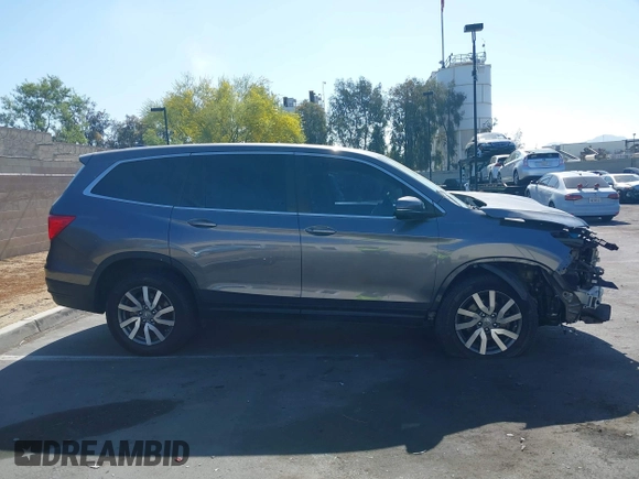2021 Honda Pilot EX with VIN 5FNYF5H35MB036402, listed as a IAAI auction lot 42280114 with Not provided miles and . Bid and sale history available at DreamBid. Image 13.
