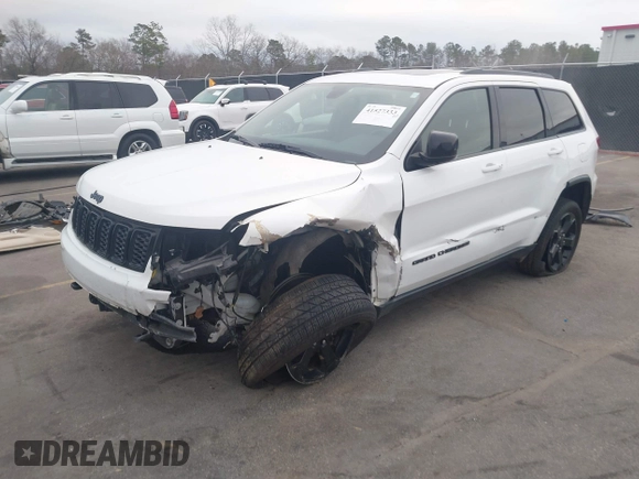 2018 Jeep Grand Cherokee Laredo E with VIN 1C4RJFAG2JC503130, listed as a IAAI auction lot 41527333 with 95,669 mi miles. Bid and sale history available at carsss.com. Image 17.