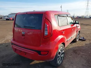 2013 Kia Soul + with VIN KNDJT2A67D7616379, listed as a IAAI auction lot 41499581 with 90,276 mi miles. Bid and sale history available at carsss.com. Image 4.