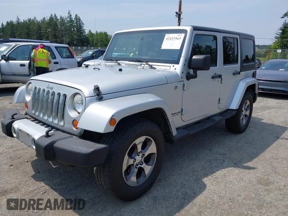 2012 Jeep Wrangler Unlimited Altitude with VIN 1C4HJWEG2CL140059, listed as a IAAI auction lot 42433563 with 189,868 mi miles and . Bid and sale history available at DreamBid. Image 17.