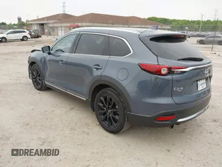 2023 Mazda CX-9 Grand Touring with VIN JM3TCBDY2P0636226, listed as a IAAI auction lot 42384360 with 161,352 mi miles and . Bid and sale history available at DreamBid. Image 3.