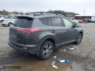 2018 Toyota RAV4 LE with VIN JTMBFREV2JJ727457, listed as a IAAI auction lot 41758208 with 65,740 mi miles. Bid and sale history available at carsss.com. Image 4.