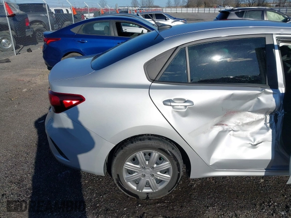 2023 Kia Rio LX with VIN 3KPA24ADXPE606463, listed as a IAAI auction lot 41728523 with 8,909 mi miles and . Bid and sale history available at DreamBid. Image 17.
