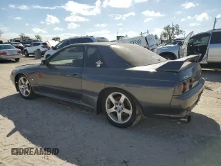 1990 Nissan Skyline z VIN BNR32010431, wystawiony jako Copart lot #78496994 z przebiegiem 182 401 mil mil oraz Nie do naprawy • Non repairable. Historia ofert i sprzedaży dostępna na DreamBid. Obrazek 2.