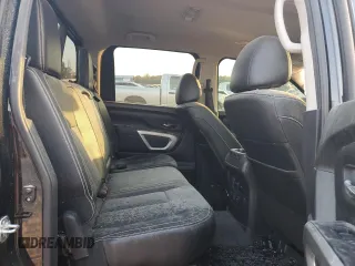 2019 Nissan Titan Pro-4X z VIN 1N6AA1E53KN525603, wystawiony jako Copart lot #77336264 z przebiegiem 64 507 mil mil oraz Szkoda całkowita • Salvage title. Historia ofert i sprzedaży dostępna na DreamBid. Obrazek 10.