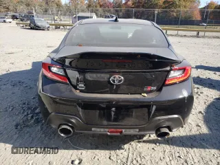 2024 Toyota GR86 Premium with VIN JF1ZNBE16R8756975, listed as a Copart auction lot 77411004 with 5,458 mi miles and Salvage Title. Bid and sale history available at carsss.com. Image 6.
