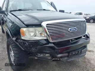 2005 Ford F-150 XLT with VIN 1FTPX14525FA14833, listed as a IAAI auction lot 41710410 with 120,458 mi miles. Bid and sale history available at carsss.com. Image 6.