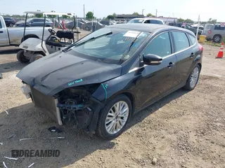 2017 Ford Focus Titanium with VIN 1FADP3N29HL319759, listed as a IAAI auction lot 42458289 with 213,674 mi miles and . Bid and sale history available at DreamBid. Image 18.
