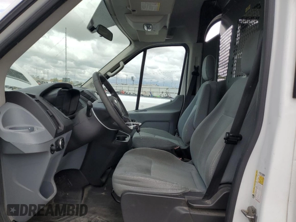 2015 Ford Transit Cargo z VIN 1FTNR1CG0FKA53031, wystawiony jako Copart lot #57058125 z przebiegiem 158 378 mil mil oraz Szkoda całkowita • Salvage title. Historia ofert i sprzedaży dostępna na DreamBid. Obrazek 7.