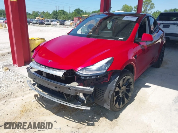 2020 Tesla Model Y Long Range with VIN 5YJYGDEE0LF029496, listed as a IAAI auction lot 41977695 with 47,958 mi miles and . Bid and sale history available at DreamBid. Image 18.